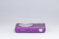 Samsung DV150F purple digital camera — top view with controls