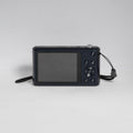 Samsung DV150F blue digital camera — back view with LCD