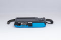 Nikon Coolpix S2600 blue digital camera — bottom view with baseplate (unit 1)