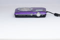 Nikon Coolpix S2600 purple digital camera — top view with controls (unit 1)