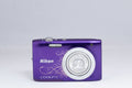 Nikon Coolpix S2600 purple digital camera — front view (unit 2)