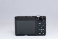 Nikon Coolpix S2600 purple digital camera — top view with controls (unit 2)