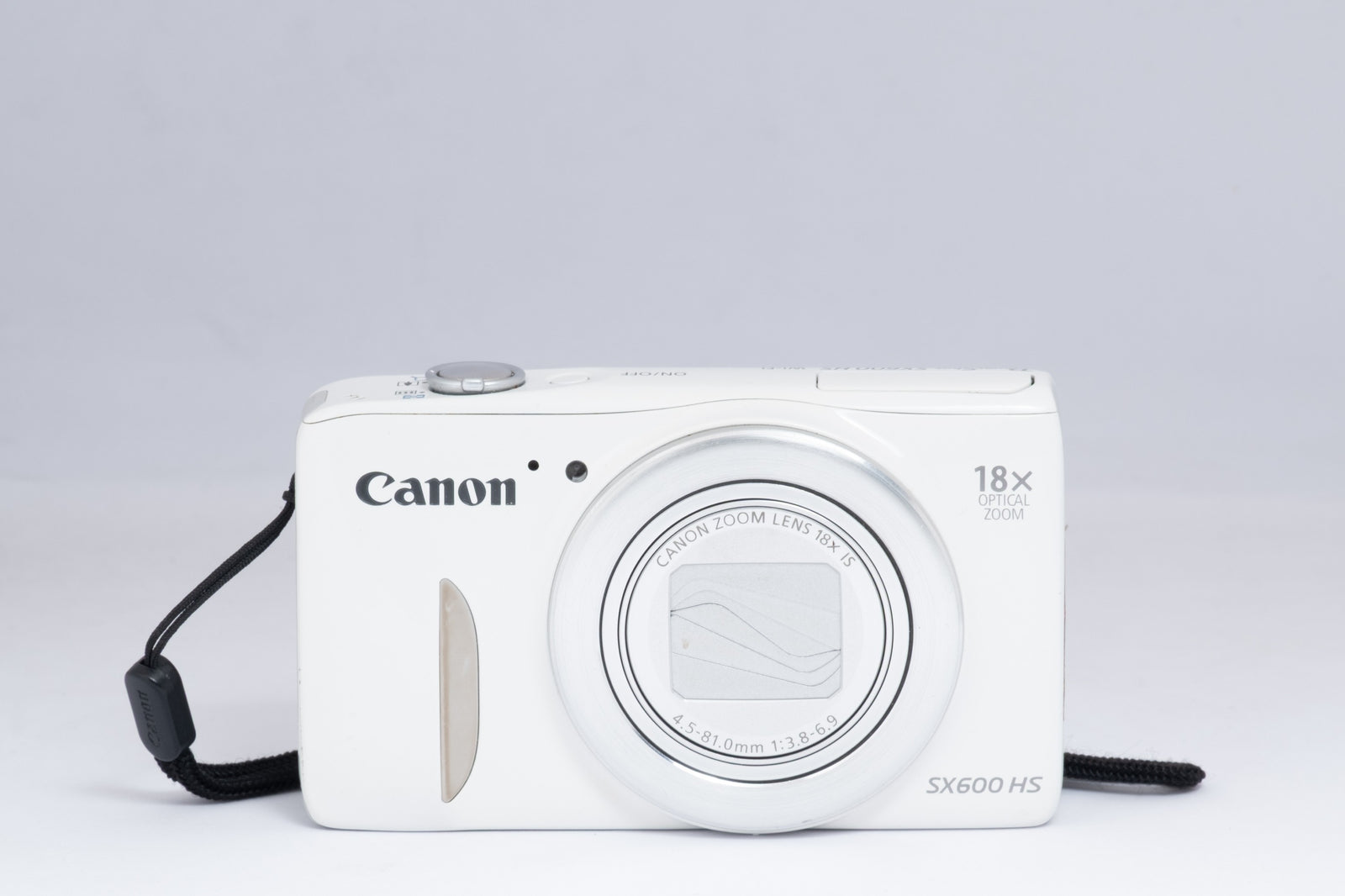 CANON POWERSHOT SX600-HS white digital camera — front view