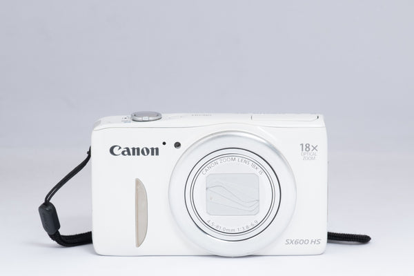 CANON POWERSHOT SX600-HS white digital camera — front view