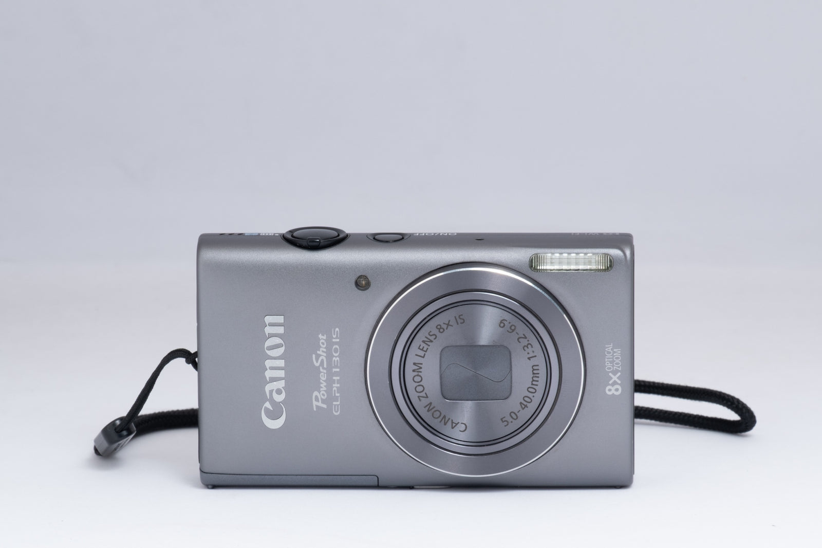CANON ELPH 130-IS silver digital camera — front view